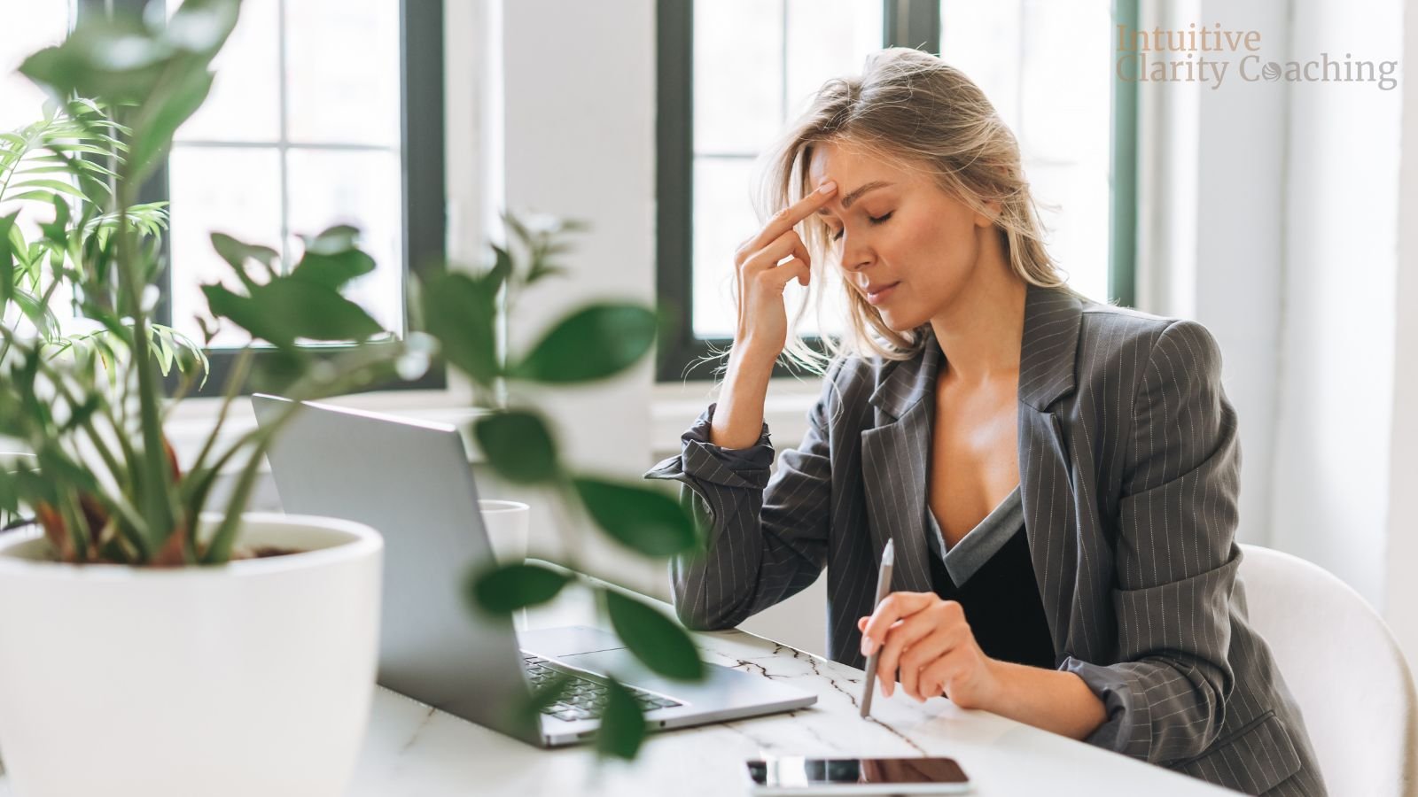 women dissatisfied with career looking like she has a headache